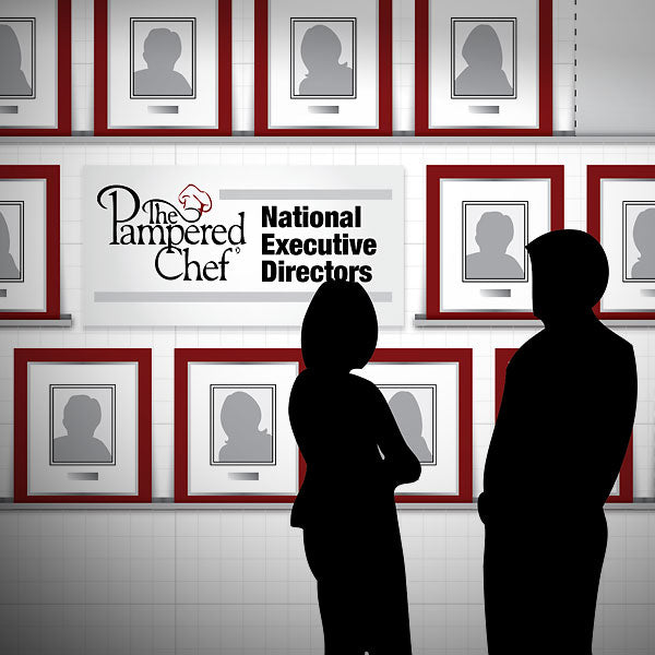 Corporate gallery wall featuring evenly spaced framed portraits in a design-led environment.