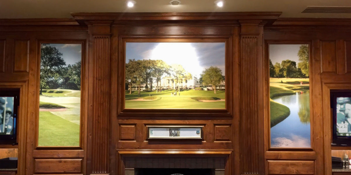 Large custom framed golf course photography installed in a traditional wood-paneled interior at Exmoor Country Club in Highland Park, Illinois.
