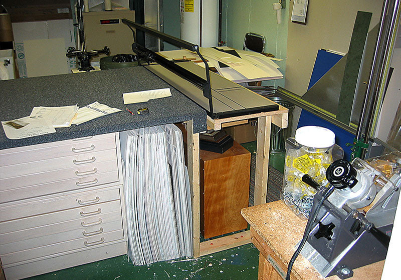 Original basement workshop where Masterpiece Framing began in 2002 as a one-man custom framing shop.
