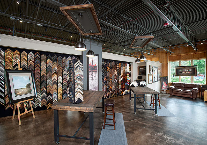 Interior of Masterpiece Framing Bloomingdale flagship location showcasing custom picture frame displays.